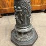 Antique column in bronzed marble carved with classical scenes, early 1900s                            