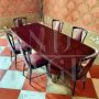 Living room set by Osvaldo Borsani with table and chairs in mahogany and rosewood