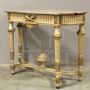 Antique Louis XVI console from the 19th century, carved, lacquered and gilded