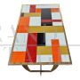 Golden design table with colored Murano glass top