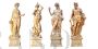 Group of 4 statues depicting the Four Seasons in travertine marble 