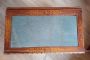 Antique inlaid coffee table with light blue velvet top