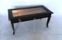 Vintage coffee table with openable showcase top