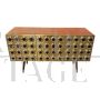 Three-door brass sideboard with circular red glass inserts