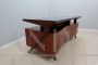 Vintage desk with a curved shape, Italian mid-century design from the 1950s