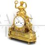 Antique clock from the Directoire period with Psyche in gilded bronze, 18th century France