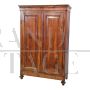 Antique wardrobe or pantry cabinet from the 19th century in walnut