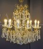 Florentine style chandelier in gilded iron and crystal