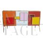 Three-door sideboard in colored glass with backlit handles