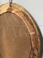 Antique oval mirror from 1840 in gold leaf