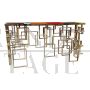 Double-sided console in golden steel with multicolored Murano glass top