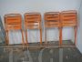 Set of 4 orange iron folding garden chairs, 1970s