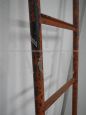 Industrial red metal ladder from the 70s