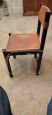 Set of four Ibisco chairs without armrests in brown leather