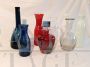 Set of 8 decorative vintage bottles from the 70s