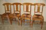 Set of 4 antique style honey walnut chairs with straw seat        