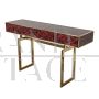 Console in brass and red glass with marbled effect