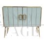 Design sideboard with two doors in white glass and brass