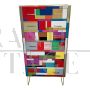 Tallboy chest of drawers in colored glass