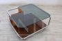 70s design coffee table in glass with wooden shelves