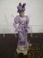 Pair of lady and gentleman statues in biscuit porcelain