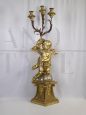 Three-branched candelabra with winged cherub, 20th century