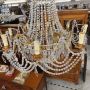 Early 1900s 8-light chandelier in gold metal with crystal drops