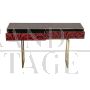 Console in brass and red glass with marbled effect