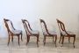 Set of four antique gondola chairs in carved walnut