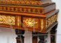 Antique sideboard or bookcase with rich inlays and bronze decorations