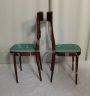 Pair of Melchiorre Bega chairs in green skai leather, 1950s