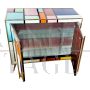 Sideboard in colored glass with illuminated mirror interior