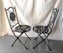 Pair of vintage folding garden chairs in iron and ceramic