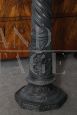 Antique column in bronzed marble carved with classical scenes, early 1900s