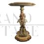 Pair of small antique style consoles carved with cherubs