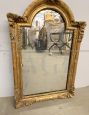 Small antique Louis Philippe mirror carved and gilded, 19th century