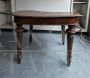 Antique extendable table with oval top