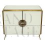 Two-door sideboard in white glass with brass handle