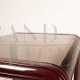 Orsay 54A table by Gae Aulenti for Knoll with glass top, burgundy color