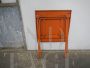 Vintage orange lacquered iron garden table, 1970s