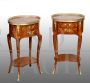 Pair of antique oval bedside tables with two drawers with inlays and bronzes