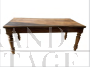 Rustic table from the late 19th century with drawers and turned legs