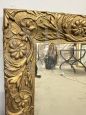 Antique gilded mirror with floral carvings, 19th century