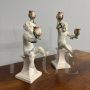 Pair of ceramic candlesticks with cherubs by Angelo Minghetti, Italy late 19th century