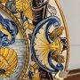 Large antique plate in Neapolitan majolica by Carlo Mollica depicting Neptune