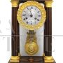 Antique Charles X pendulum clock in inlaid rosewood, 1800