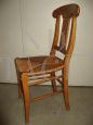 Set of 4 antique style honey walnut chairs with straw seat