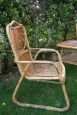 Set of armchairs and table in wicker