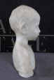 Marble bust sculpture of a child from the early 1900s