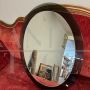 Vintage 1970s oval mirror with green glass frame